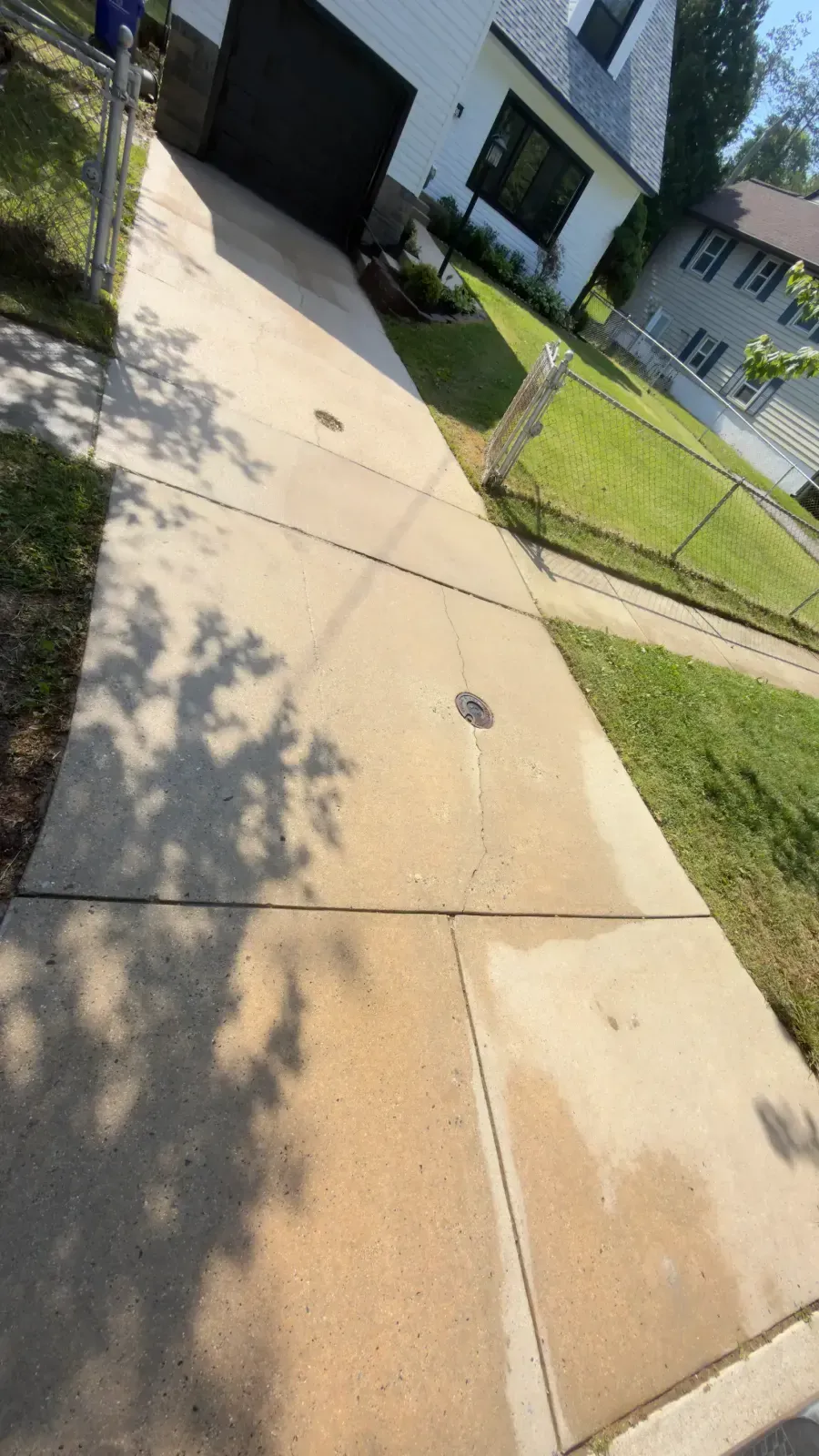 Driveway after professional pressure washing in Silver Spring, MD