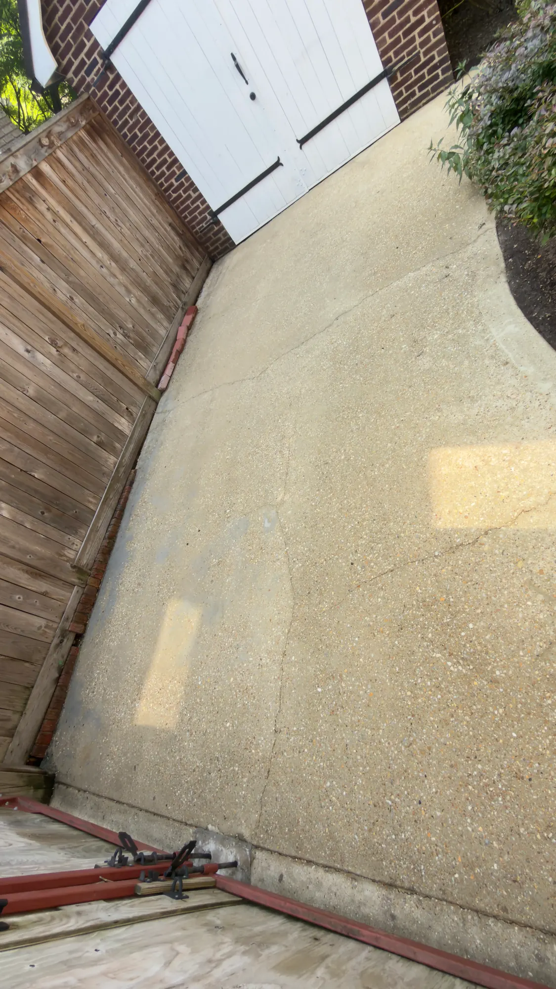 Driveway after professional pressure washing in Silver Spring, MD