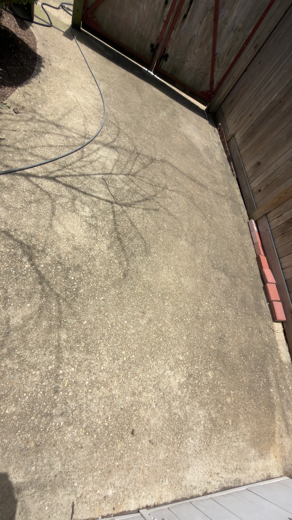 Driveway before pressure washing in Silver Spring, MD