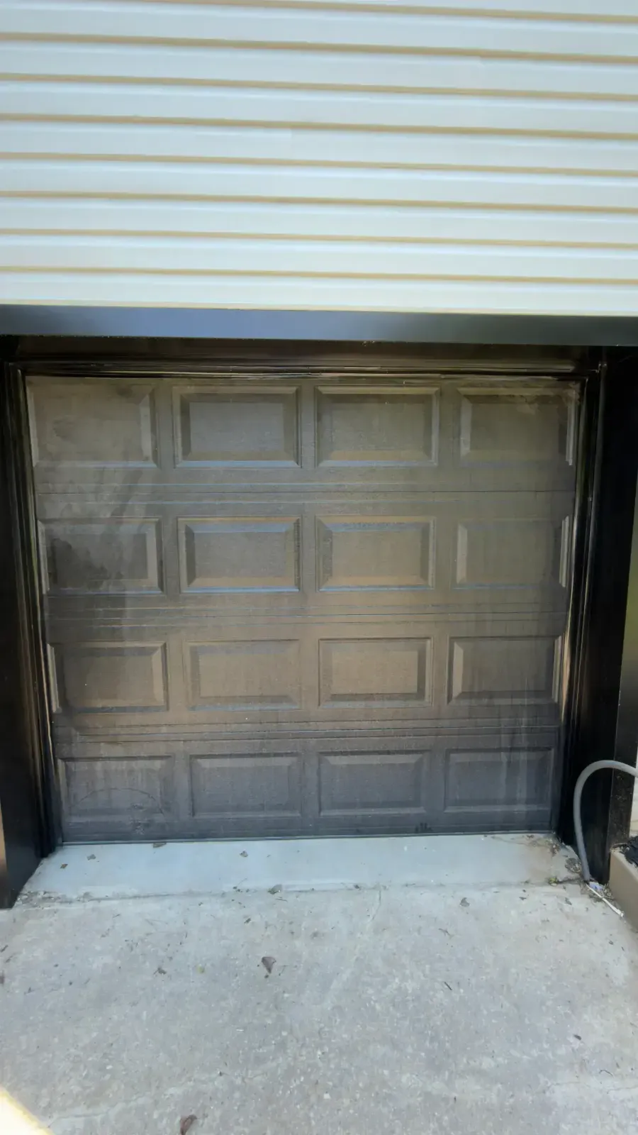 Garage before pressure washing in Silver Spring, MD